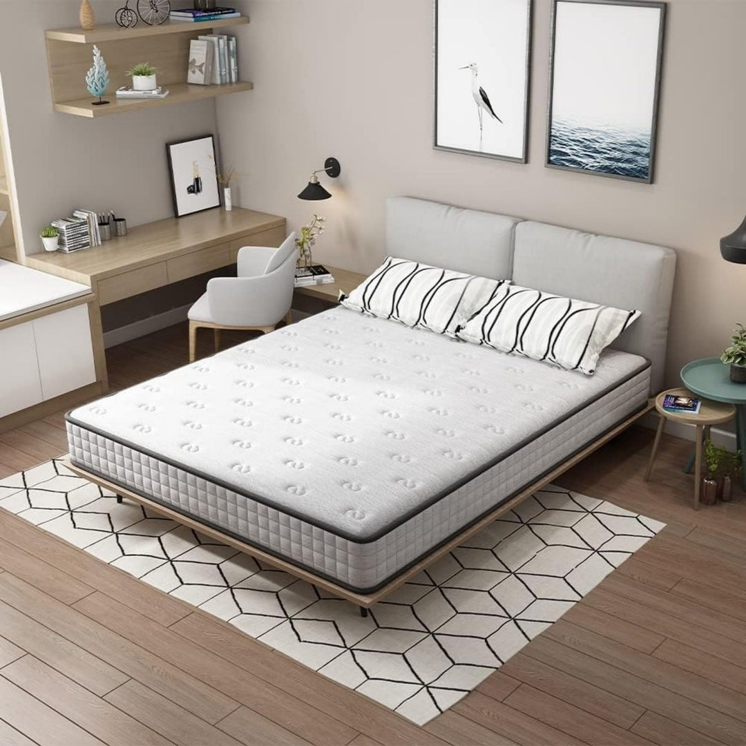 Sommier tapissier finition tissu gris clair